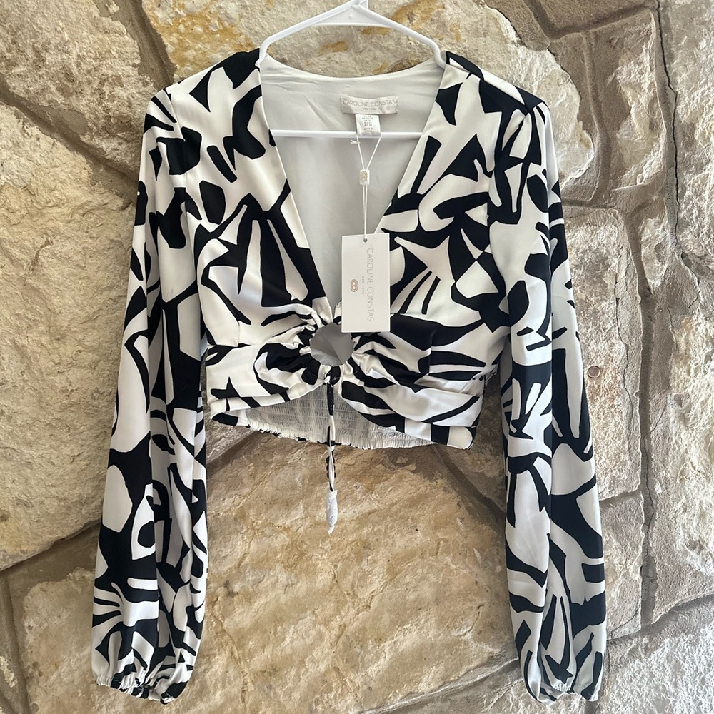 NWT CAROLINE CONSTAS BLACK AND WHITE TROPICAL GEOMETRIC KEYHOLE CUT OUT BLOUSE